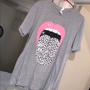 Lips and tongue with cheetah shirt